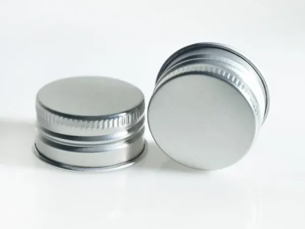 Pilfer-Proof & Screw Cap Stock For pilfer-proof and screw closures, the material specification is selected according to cap diameter, drawing depth, thread forming and finished cap strength. Material Requirements: Forming control · Strength · Gauge tolerance · Surface quality